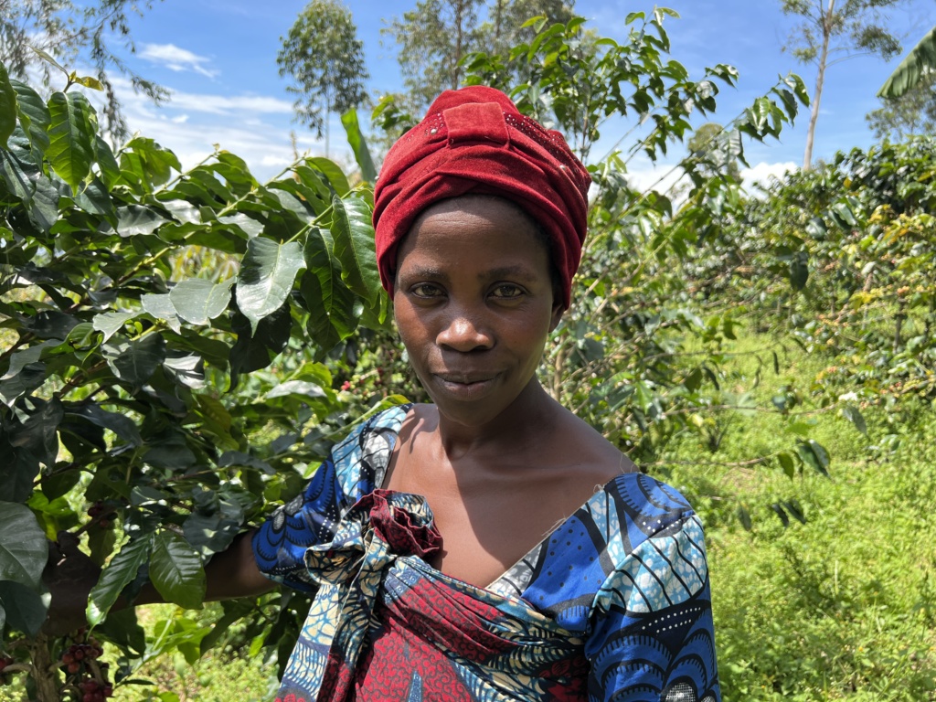 Rebuild Women's Hope: a woman in a coffee field.